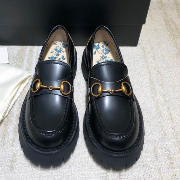 Gucci Black Leather Loafers with Gold Accents - Picture 1 of 5